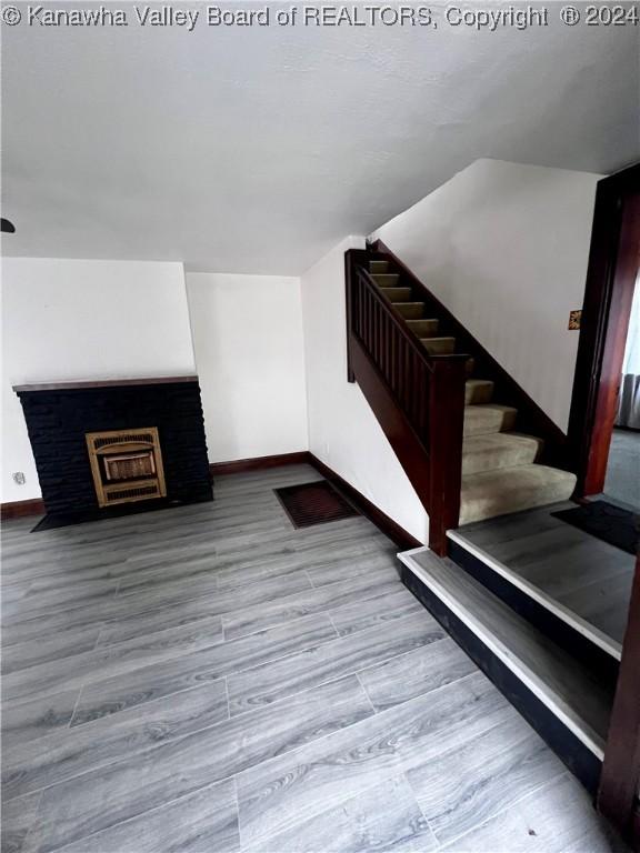 stairs with wood-type flooring