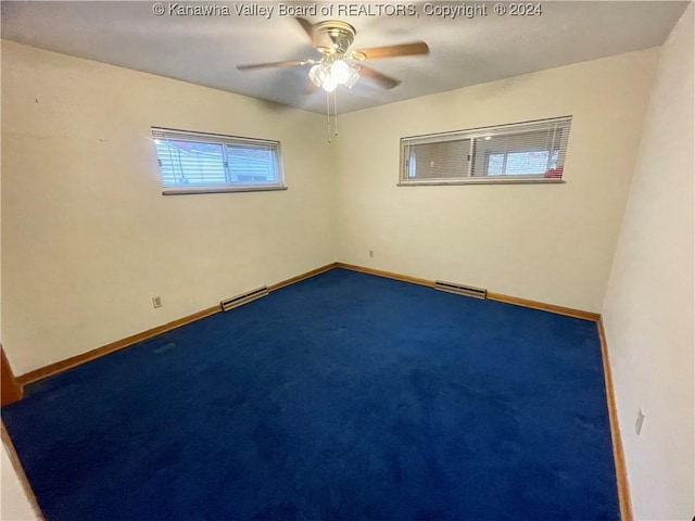 carpeted empty room with baseboard heating and ceiling fan