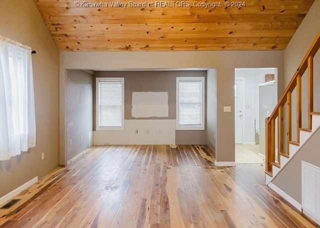 interior space with wooden ceiling, lofted ceiling, and light wood-type flooring