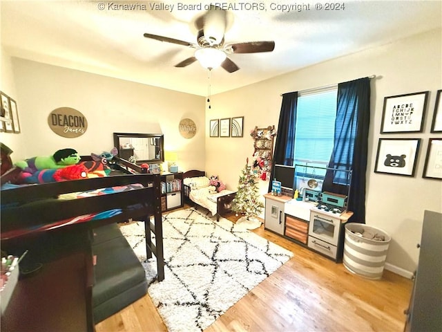 interior space featuring ceiling fan and light hardwood / wood-style floors