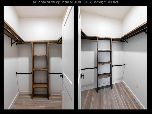 walk in closet with light wood-type flooring