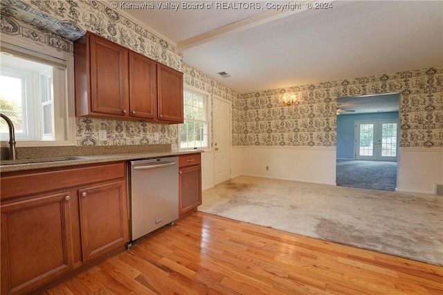 kitchen with french doors, dishwasher, light hardwood / wood-style floors, and plenty of natural light