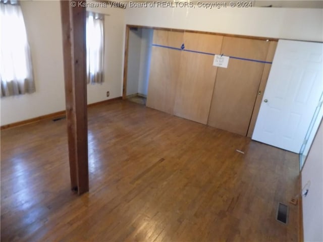 interior space with dark wood-type flooring