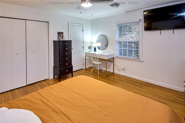 bedroom featuring wood-type flooring and ceiling fan