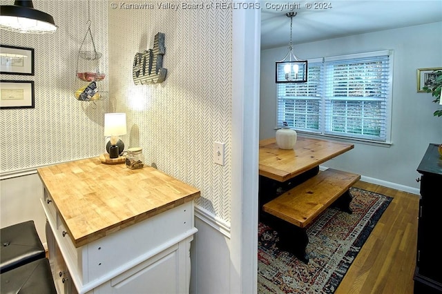 dining area with dark wood-type flooring