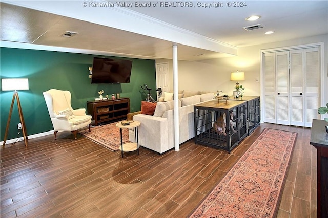 living room with dark hardwood / wood-style floors