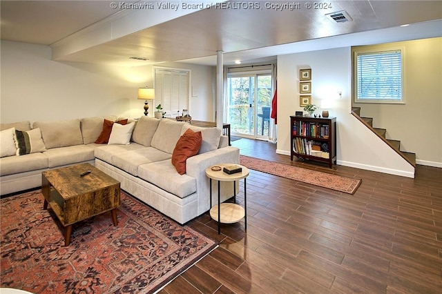 living room featuring dark hardwood / wood-style flooring