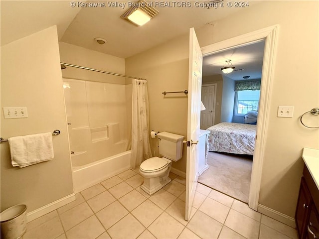 full bathroom with tile patterned flooring, shower / bath combo, toilet, and vanity