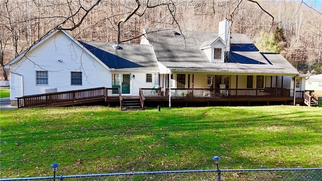 back of house with a yard