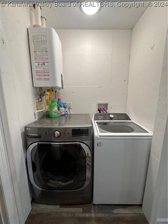 washroom featuring washer and dryer