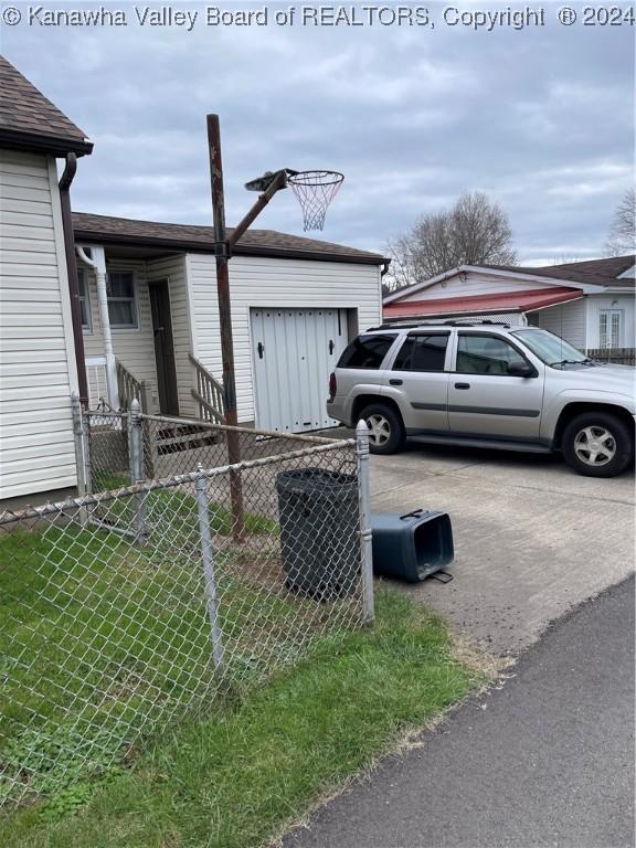 view of property exterior with a yard