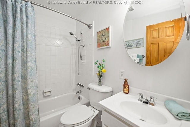 full bathroom featuring vanity, toilet, and shower / tub combo