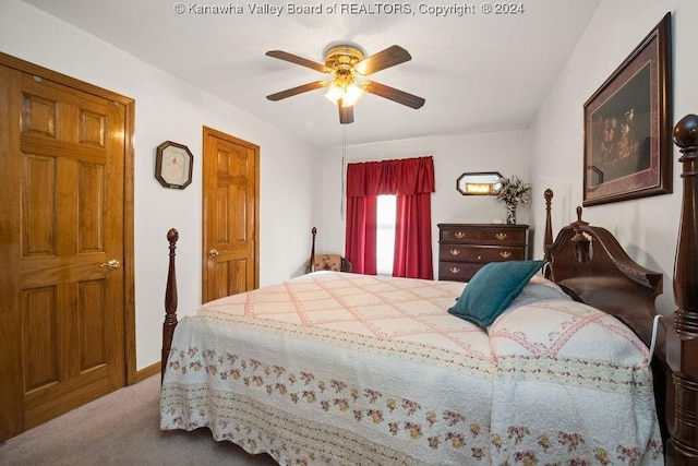 carpeted bedroom with ceiling fan