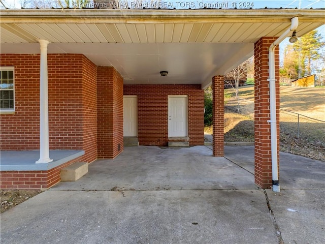 view of patio / terrace with a carport