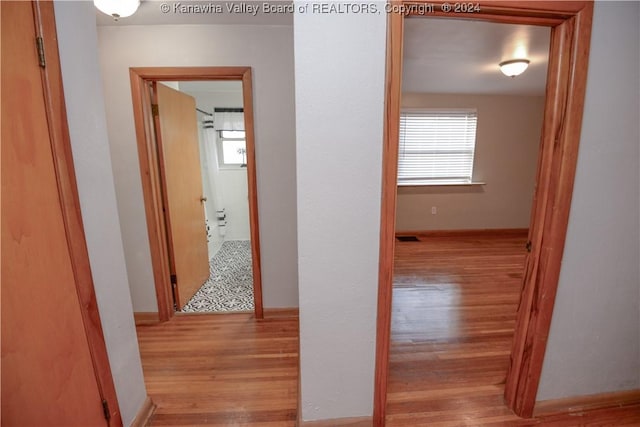 hall featuring light hardwood / wood-style flooring