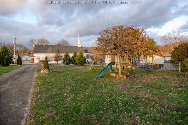 view of play area featuring a lawn