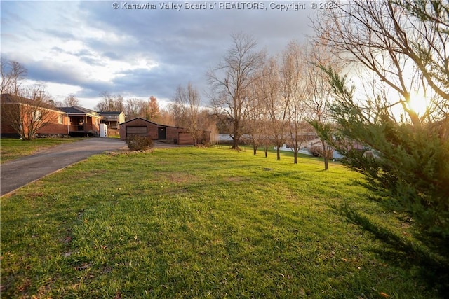 view of yard featuring a garage