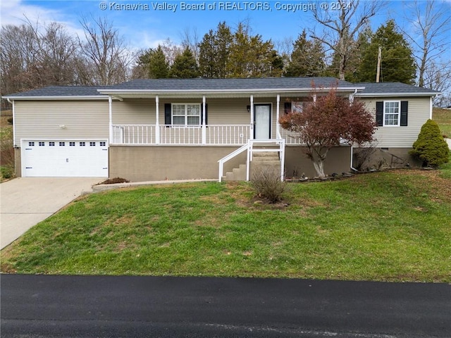 single story home with covered porch and a front yard