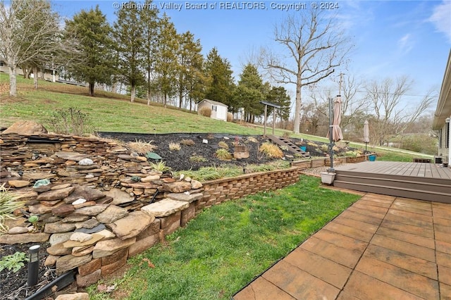 view of yard with a wooden deck