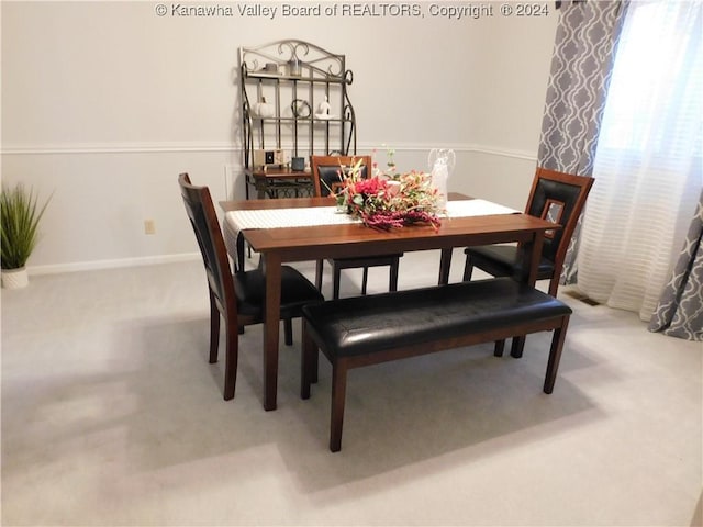 dining room featuring carpet floors