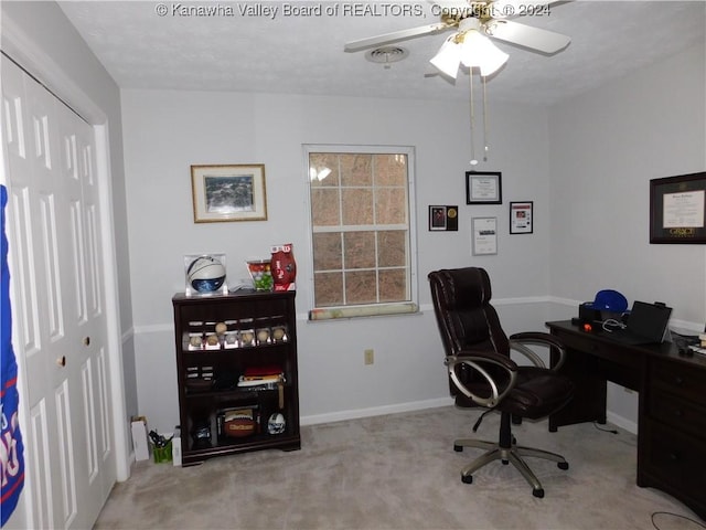 office area with ceiling fan and light colored carpet