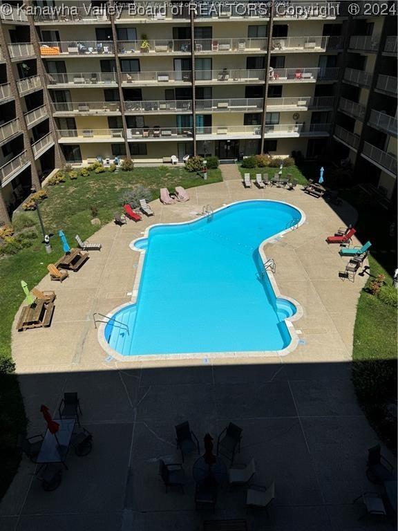 view of pool featuring a patio area