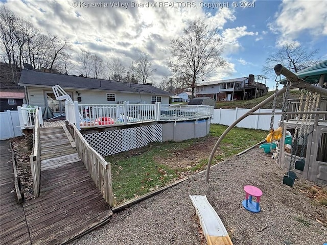 view of yard featuring a pool side deck