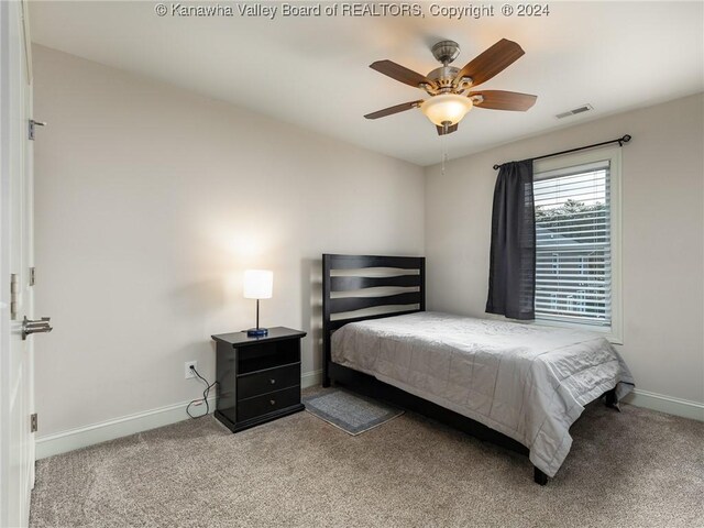 bedroom with carpet flooring and ceiling fan