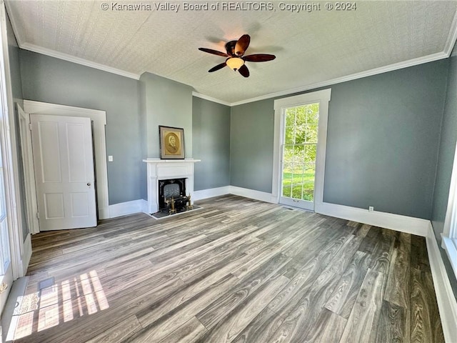 unfurnished living room featuring ceiling fan, light hardwood / wood-style flooring, and ornamental molding