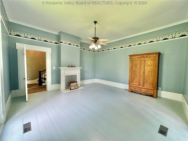 unfurnished living room featuring crown molding, light hardwood / wood-style flooring, and ceiling fan