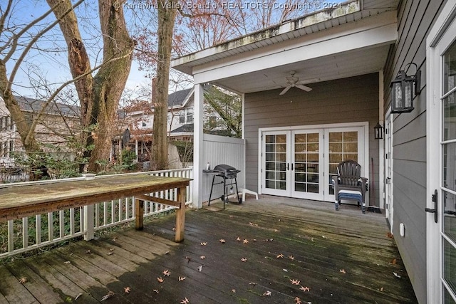 deck with grilling area, ceiling fan, and french doors