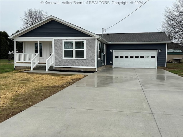 single story home featuring covered porch and a garage