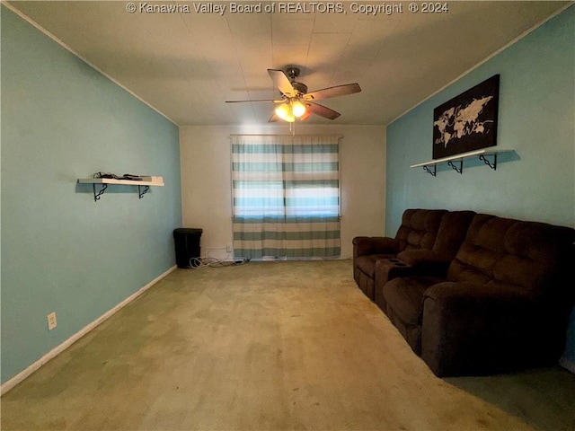 living room featuring carpet flooring and ceiling fan