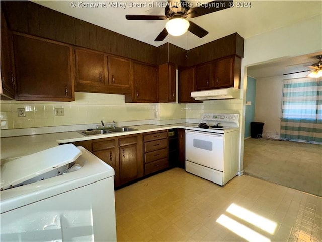 kitchen with tasteful backsplash, ceiling fan, sink, and white electric stove