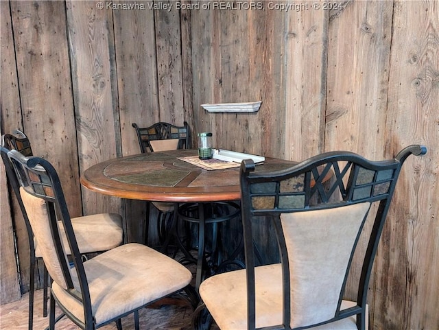 dining room with wood-type flooring