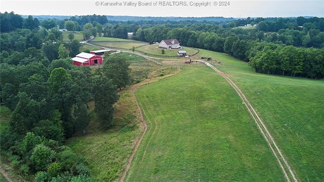 birds eye view of property featuring a rural view