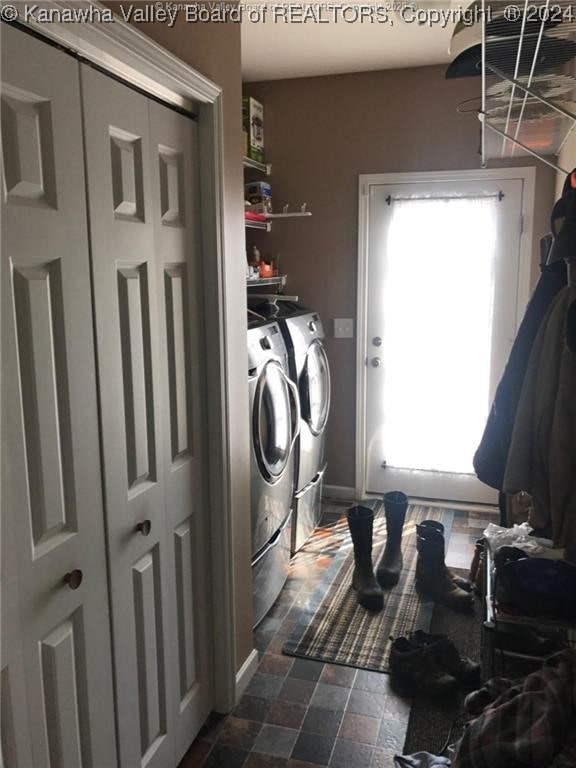 laundry area with washer and clothes dryer