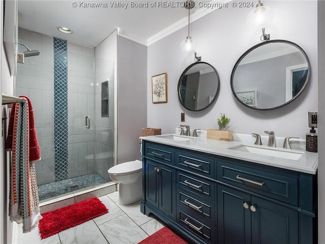 bathroom featuring vanity, toilet, a shower with shower door, and ornamental molding