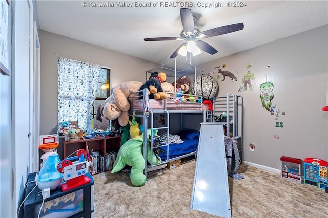 carpeted bedroom with ceiling fan