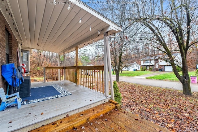 wooden deck featuring a porch