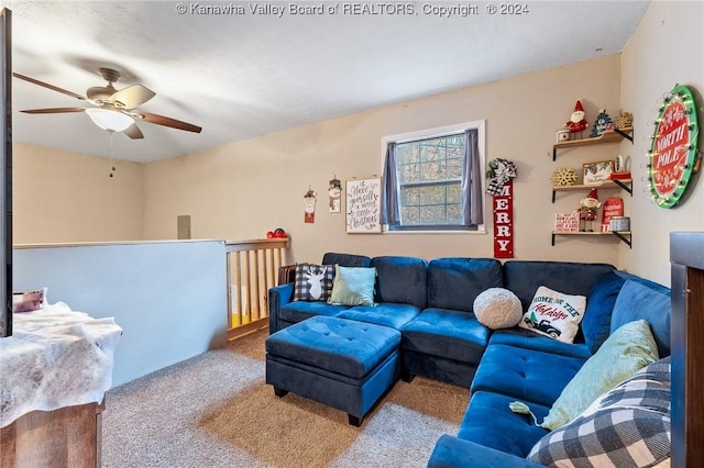 carpeted living room with ceiling fan