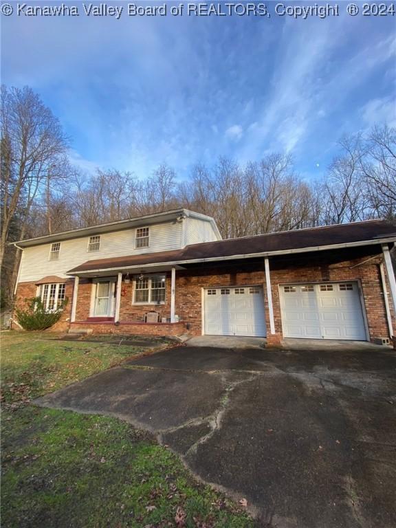 view of front of home with a garage