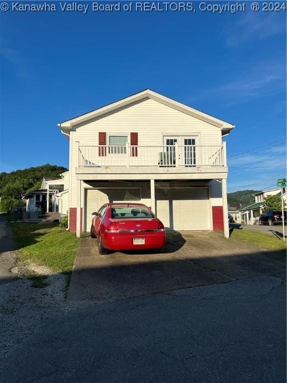 view of front of property with a garage