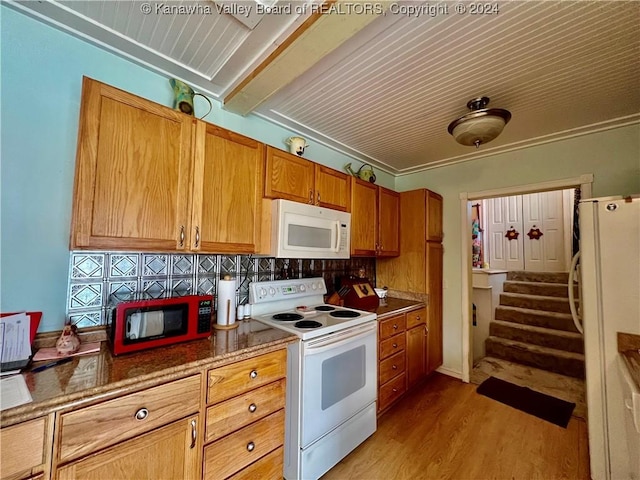 kitchen featuring white appliances, tasteful backsplash, and light hardwood / wood-style flooring