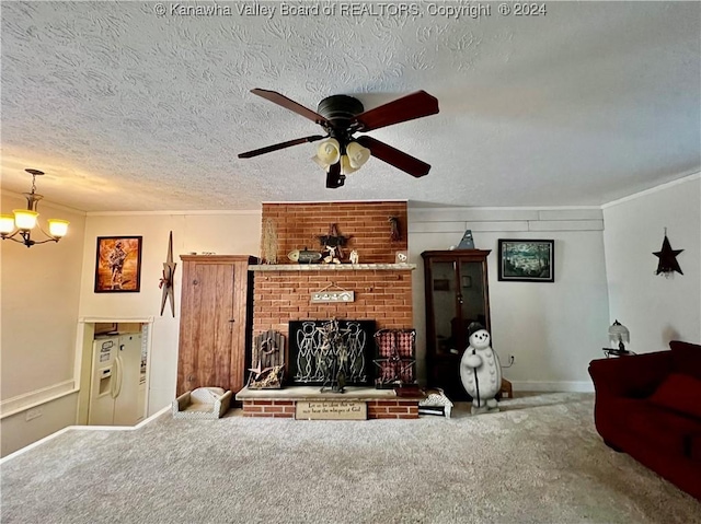 living room with carpet floors, ceiling fan with notable chandelier, a textured ceiling, and a brick fireplace