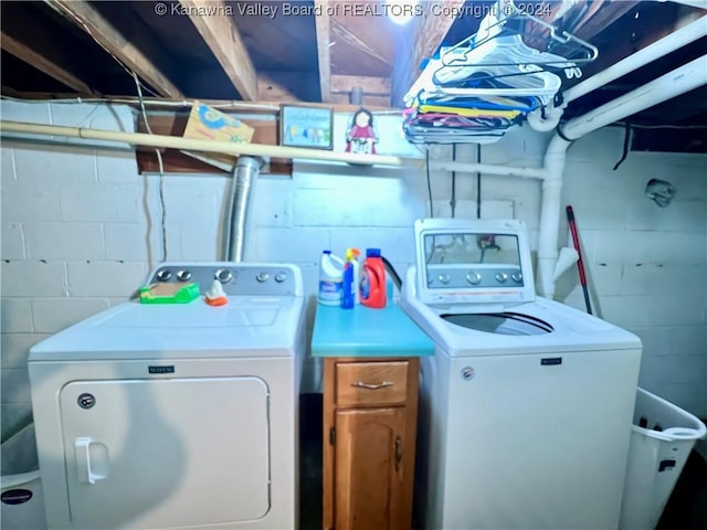 laundry area with washer and clothes dryer