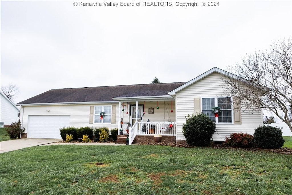 18 Cardinal Dr, Milton, WV 25541 - ranch-style home with a front lawn, a porch, and a garage