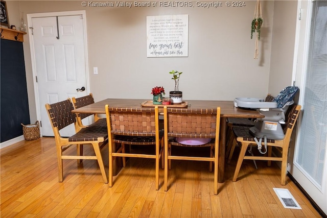 dining room with light wood-type flooring