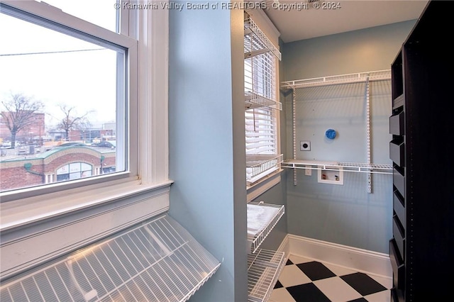 bathroom featuring tile patterned floors and baseboards