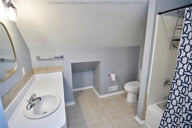 bathroom featuring vanity, visible vents, baseboards, lofted ceiling, and toilet